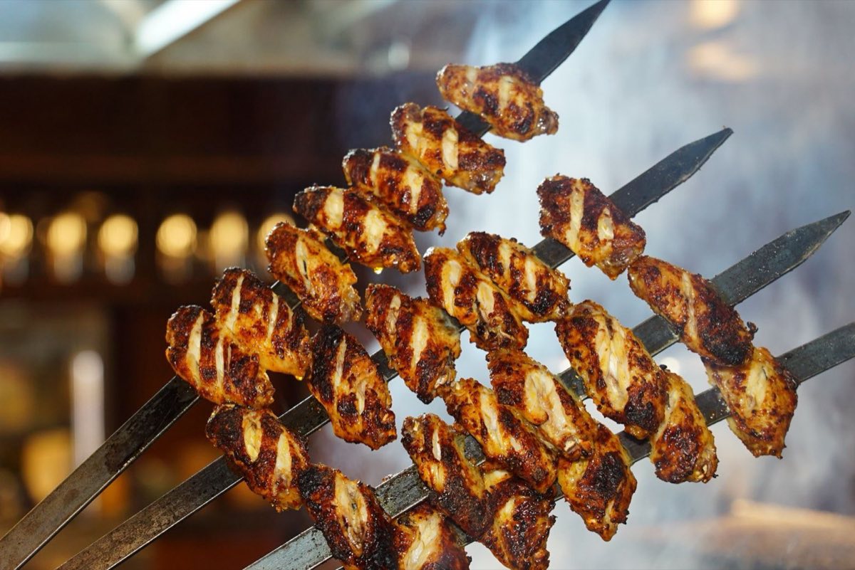 Djaj Meshwi — Whole chicken pieces marinated overnight in lemon juice, garlic, seven spice, and a breath of cinnamon, then