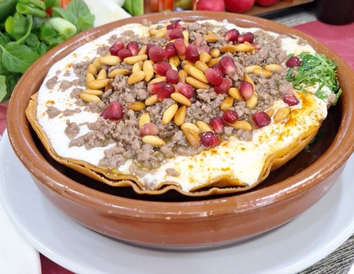 Mountain-Style Chicken Fatteh — Mountain fatteh built on a base of toasted flatbread, layered with pulled chicken, chickpeas, and a thick