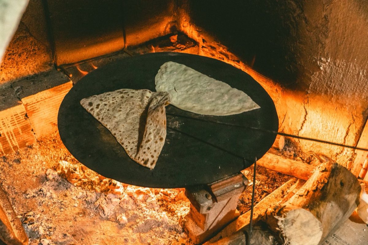 Idlib Wood-Fired Flatbread — The bread of Idlib: thicker than Lebanese pita, more yielding than a Turkish flatbread, with a scorched crust