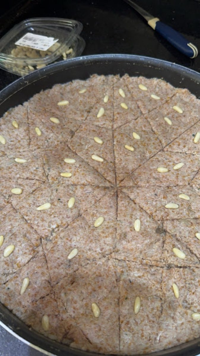 Kibbeh Samakieh — Fish Kibbeh from Tripoli — A masterpiece of Tripoli's coastal kitchen: fine bulgur shells filled with spiced fish and caramelized onion