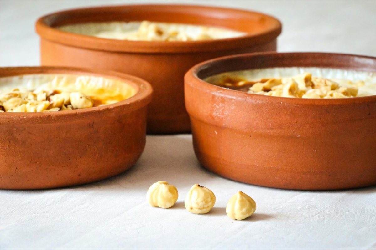 Meghli — A fragrant spiced rice flour pudding simmered with caraway, cinnamon, and anise, served at room temperature