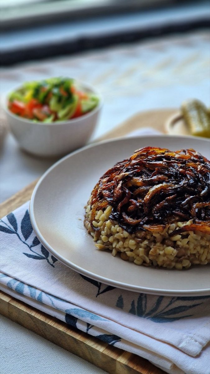 Red Mjadara — South Lebanese Lentils with Bulgur — Red lentils cooked down to a porridge-like consistency with coarse bulgur, finished with a mountain of deeply