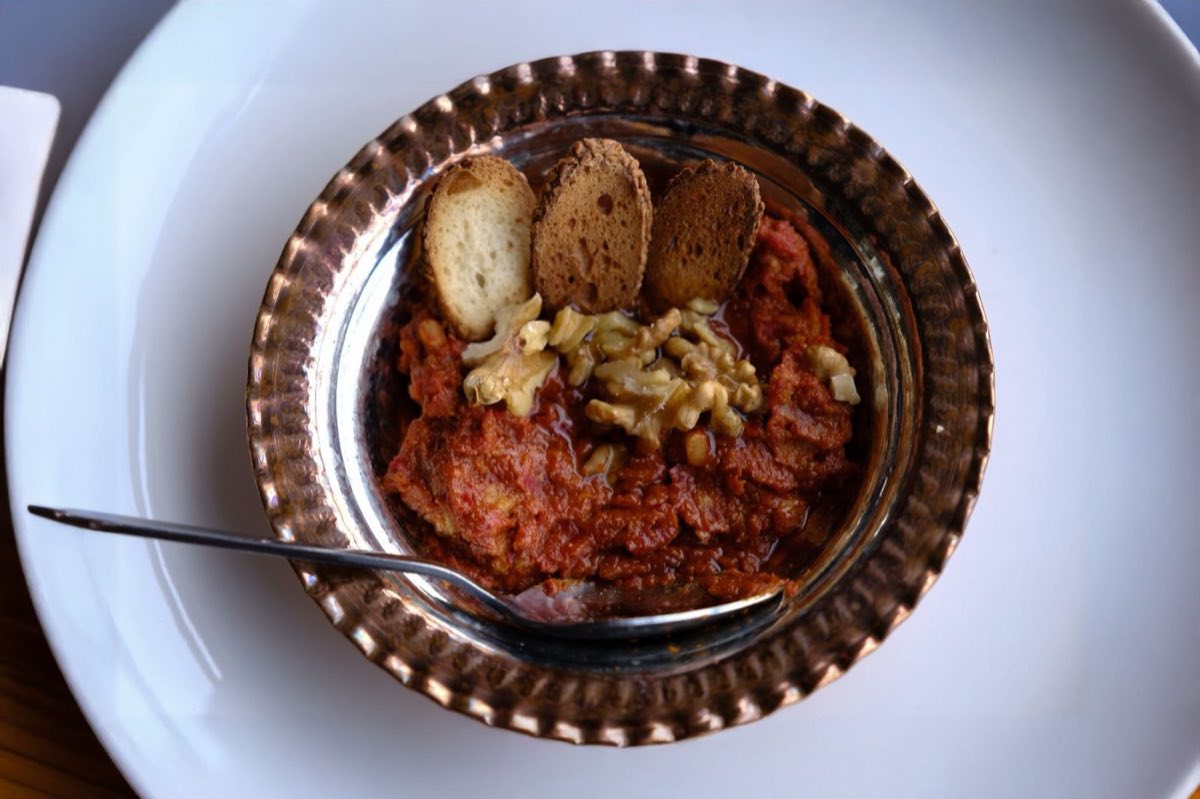 Muhammara — A bold, smoky dip of roasted red peppers and walnuts with pomegranate molasses