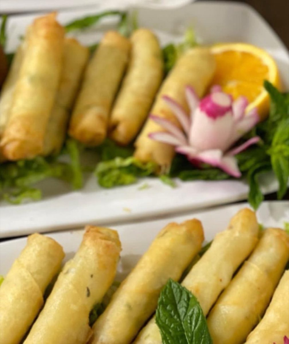 Rakakat bil Jibn — Thin phyllo pastry rolled around a filling of white cheese, fresh herbs, and a pinch of Aleppo pepper, then