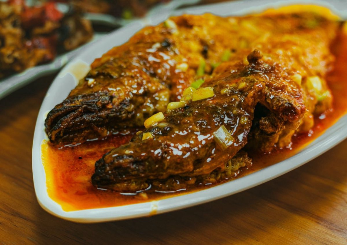 Tripoli-Style Spicy Fish — The Tripoli version of spicy fish: heavier on tahini than the Sidon version, with caramelized onions and pine