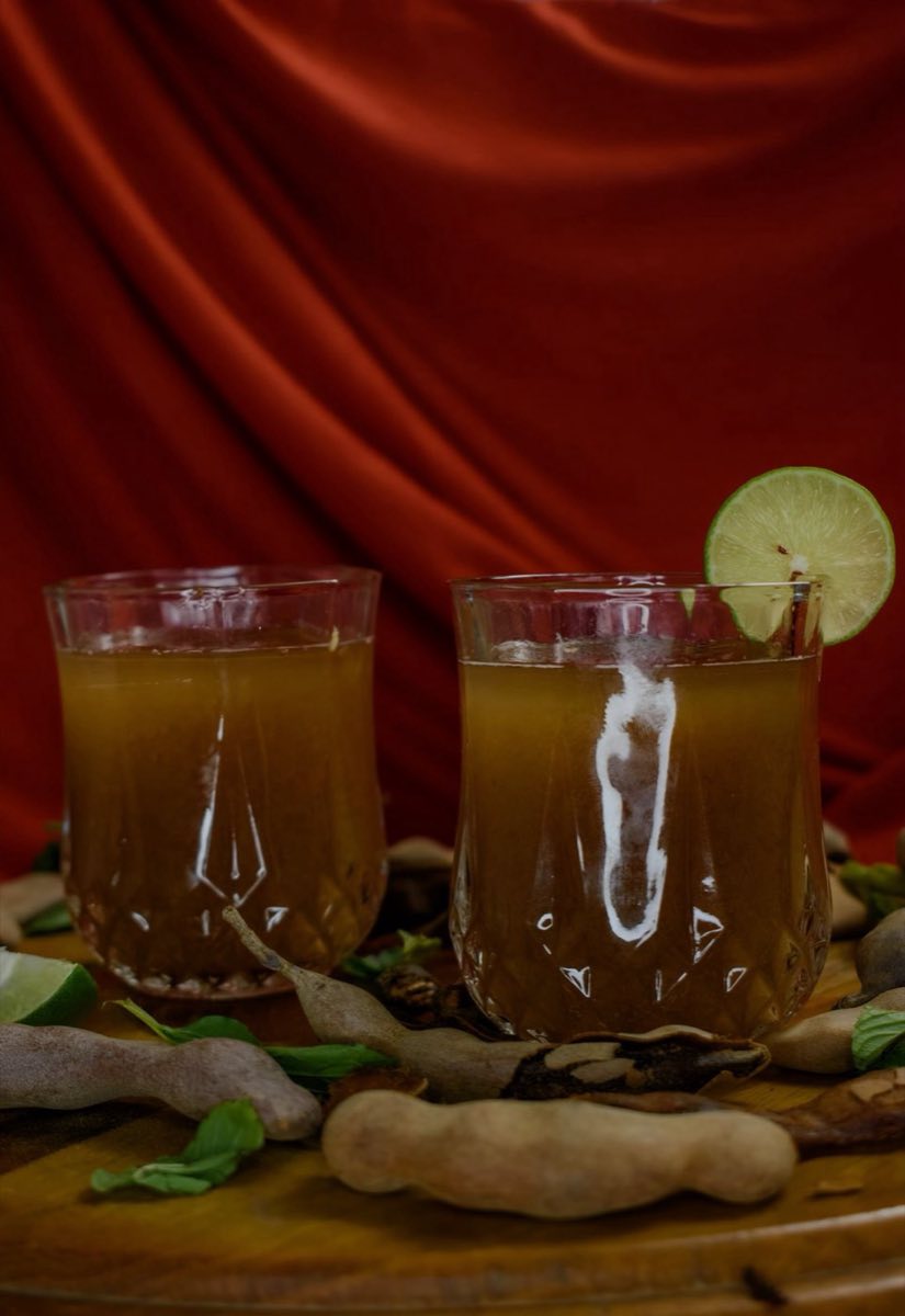 Sharab Tamar Hindi — Tamarind Cooler — A sweet-sour, deep mahogany drink made from tamarind paste dissolved in water with sugar and a hit of rose