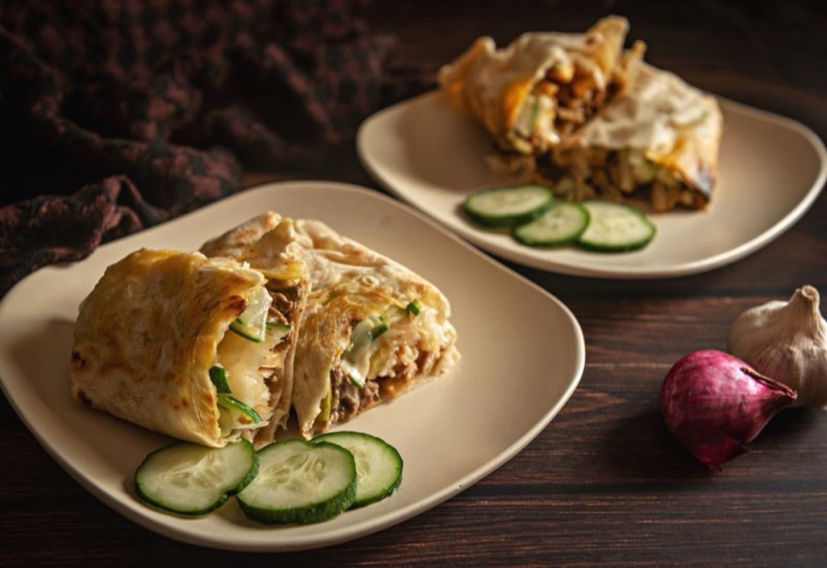 Shawarma Djaj — Chicken thighs marinated in a bold Lebanese spice blend and cooked until tender and slightly charred, sliced